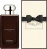 A bottle of Jo Malone Dark Amber & Ginger Lily Cologne Intense and its gift box. Produktbild-Vorschau