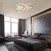 A modern bedroom with a large window, a bed, and a ceiling light. Náhled obrázku produktu