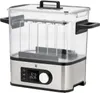 A silver and clear sous vide cooker with a digital display. Produktbild-Vorschau