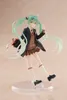 A studio shot of a Hatsune Miku figurine in a preppy school uniform. Podgląd zdjęcia produktu