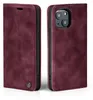 A burgundy flip case for an iPhone 13 is shown open, displaying the inside of the case and the camera cutout on the back of the phone. Produktbild-Vorschau