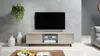 A modern living room scene featuring a TV lowboard with a television and media devices. Produktbild-Vorschau