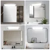 A collage of four bathroom scenes featuring a modern LED mirror light. Anteprima dell’immagine prodotto