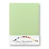 A light green fitted sheet is shown flat against a white background. Below the sheet is a strip displaying various color swatches and text. Produktbild-Vorschau