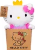 A Hello Kitty plush toy wearing a crown and a pink dress, sitting in a brown paper bag with Hello Kitty branding. Anteprima dell’immagine prodotto