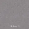 A close-up of a textured gray fabric with text at the bottom. Produktbild-Vorschau