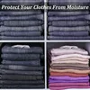 Stacks of folded clothes in shelves. Produktbild-Vorschau