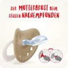 A NUK pacifier is shown in a close-up view, with illustrative diagrams on the right side showing how the pacifier mimics the mother's breast during feeding. Produktbild-Vorschau
