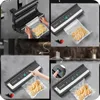 A collage of four images showing a vacuum sealer in use, demonstrating how to seal bags of sliced lemons. Náhľad obrázku produktu