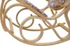 A close-up view of the curved wooden frame and patterned fabric of a rocking chair. Podgląd zdjęcia produktu