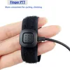 A close-up shot of a finger wearing a black PTT button accessory with a wire attached. Produktbild-Vorschau