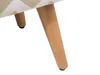 Close-up of the wooden legs and patterned fabric of a stool or ottoman. Náhled obrázku produktu