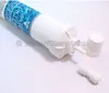 A water filter cartridge with its caps and a connector piece on a white background. Náhľad obrázku produktu