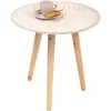 A small round side table with a decorative top and three wooden legs, with a cup and saucer and a cookie on top. Produktbild-Vorschau
