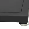 Close-up of the corner of a black garment rack, showing the edge of the top surface and one of its silver feet. Produktbild-Vorschau