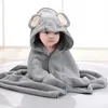 A baby wearing an elephant-themed hooded towel. Produktbild-Vorschau