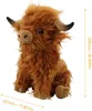 A plush toy of a Highland cow sitting down. Produktbild-Vorschau