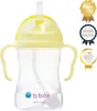 A yellow and clear baby sippy cup with handles and a straw, shown on a white background with award badges on the right. Podgląd zdjęcia produktu