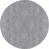 A circular, gray, shaggy carpet.