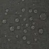 Close-up of water droplets on a textured dark gray fabric. Produktbild-Vorschau