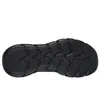The bottom view of a black sneaker sole. Voir les images du produit