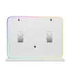 The back of a white rectangular mirror with a colored LED light strip around the edge, mounted on a white shelf. Náhled obrázku produktu