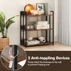 A three-tier shelf unit with various decorative items on it, with a close-up inset of an anti-tipping device. Podgląd zdjęcia produktu