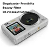 A white digital camera with text overlays describing its features. Produktbild-Vorschau