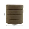 A stack of four round, brown ottoman-like objects, possibly storage stools, are shown against a white background. Dimensions are indicated with lines and text. Produktbild-Vorschau