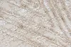 A close-up view of a textured carpet with a patterned design. Produktbild-Vorschau