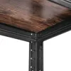 A close-up view of the corner of a shelf unit, showing the wooden shelf and the black metal frame. Náhled obrázku produktu