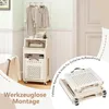A beige laundry cart with a clothes rack and storage shelves is shown in a room with a bathtub and a door. Náhled obrázku produktu