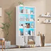 A white bookshelf with LED lighting is displayed in a room with plants and other decor. Produktbild-Vorschau