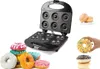 A donut maker with several donuts around it and some donuts being held or stacked. The image is a collage of the donut maker and various donuts. Náhled obrázku produktu