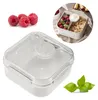 A collage showing a white lunchbox with compartments, raspberries, and basil leaves. Podgląd zdjęcia produktu