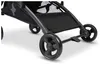 Close-up view of the wheels and lower frame of a black stroller. Voir les images du produit