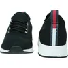 A studio shot of a pair of black Tommy Jeans sneakers, shown from the front and back. Produktbild-Vorschau