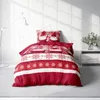 A Christmas-themed duvet cover and pillow set displayed on a bed. Produktbild-Vorschau