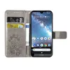 A flip case wallet for a Nokia 6.2 phone, shown open with cards and a bill inside. Produktbild-Vorschau