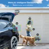 A car with its trunk open, a person walking a dog in front of a garage door, with AI detection zones highlighted. Náhled obrázku produktu
