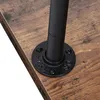 Close-up of a pipe leg attachment on a wooden surface. Náhled obrázku produktu