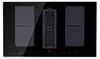 A top-down view of a black induction cooktop with two grill zones and a central ventilation grate. Náhľad obrázku produktu