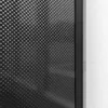 A close-up view of a black shower wall with a dotted pattern, positioned next to a textured white wall. Anteprima dell’immagine prodotto