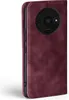 A close-up, side view of a burgundy flip phone case for a Xiaomi Redmi A3. Produktbild-Vorschau