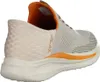 A side view of a single beige and orange sneaker. Voir les images du produit