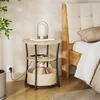 A bedside table next to a bed in a bedroom. Produktbild-Vorschau