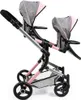 A side view of a twin doll stroller against a white background. Náhľad obrázku produktu