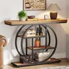 A console table with shelves, decorated with books, a plant, and a lamp, placed in a room setting. Voir les images du produit
