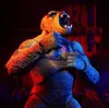 A close-up shot of a King Kong action figure with dramatic lighting. Podgląd zdjęcia produktu