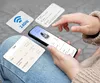 A person is holding a smartphone and interacting with an app, with other informational cards floating around. Anteprima dell’immagine prodotto